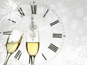 depositphotos_87749704-stock-photo-champagne-over-fireworks-and-clock